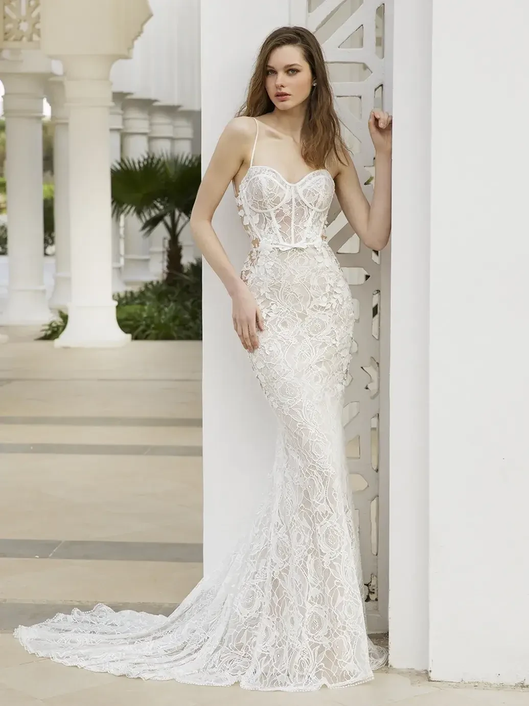 For the Bride Who Loves Drama: Our Favorite Gowns with Bold Back Details Image