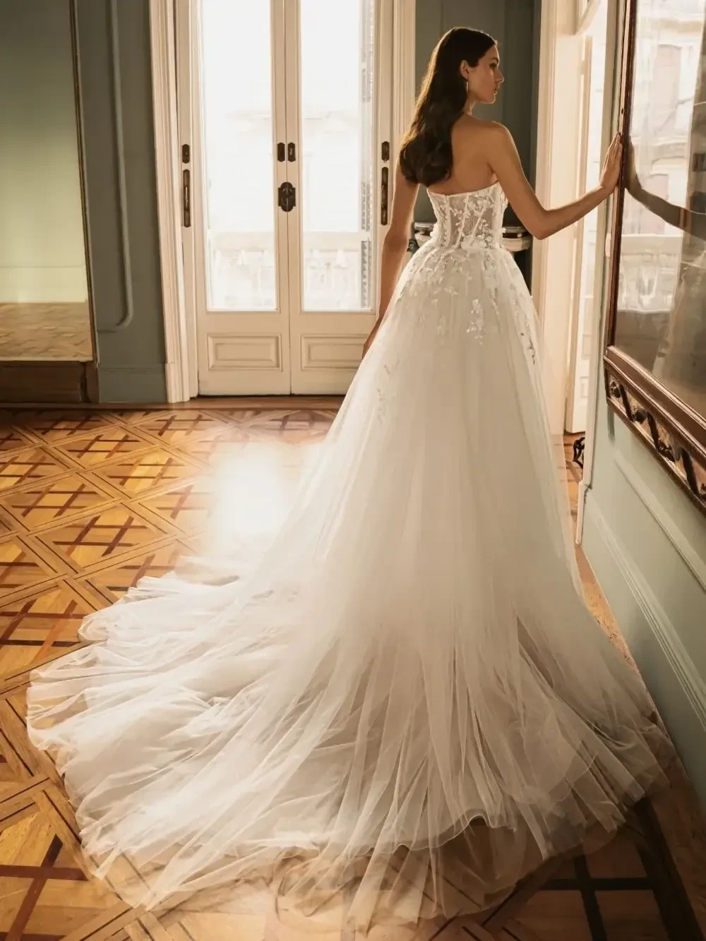 model is wearing a strapless a-line bridal gown